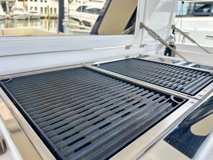  Yacht Photos Pics Outdoor grill on 2023 Azimut Verve 47 yacht, docked at marina.