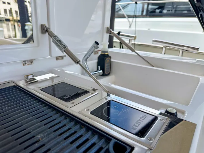  Yacht Photos Pics Outdoor kitchen on 2023 Azimut Verve 47 yacht with Kenyon grill.