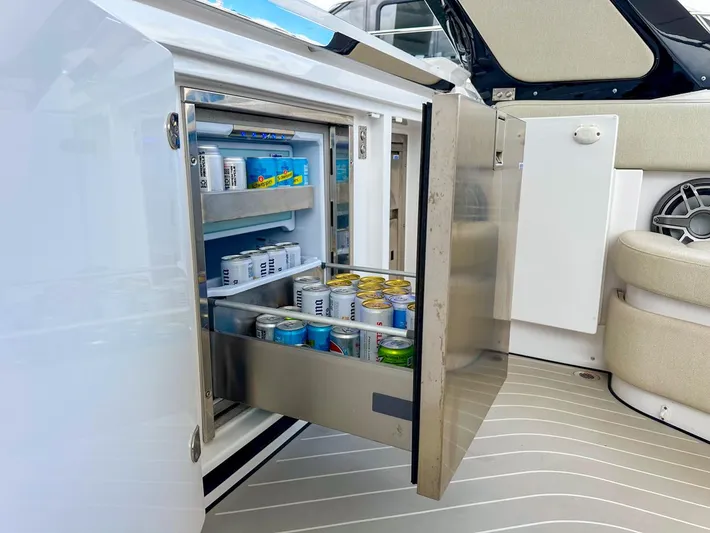  Yacht Photos Pics 2023 Azimut Verve 47 yacht with open fridge stocked with beverages.