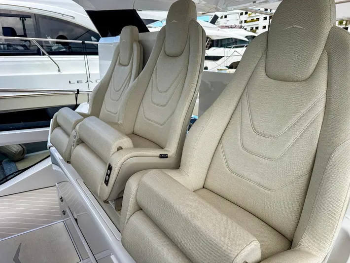  Yacht Photos Pics 2023 Azimut Verve 47 luxury boat seats, beige upholstery, modern design.