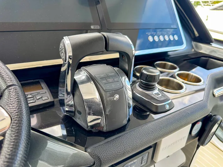  Yacht Photos Pics Control panel of 2023 Azimut Verve 47 yacht with throttle and joystick.