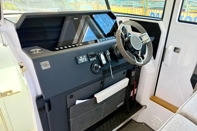  Yacht Photos Pics Helm console of the 2025 Axopar 37 XC CROSS CABIN.