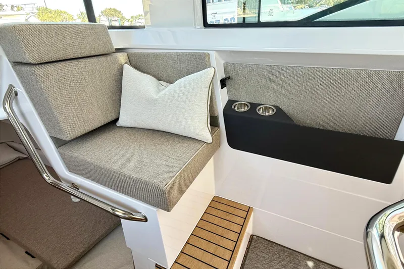  Yacht Photos Pics Interior of Axopar 37 XC CROSS CABIN 2025 with seating area.