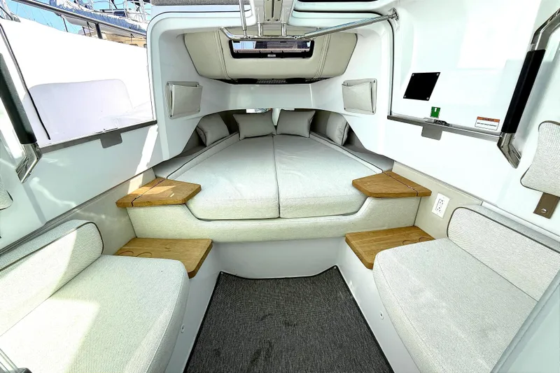  Yacht Photos Pics Luxurious interior of 2025 Axopar 37 XC CROSS CABIN with comfortable seating and modern design.
