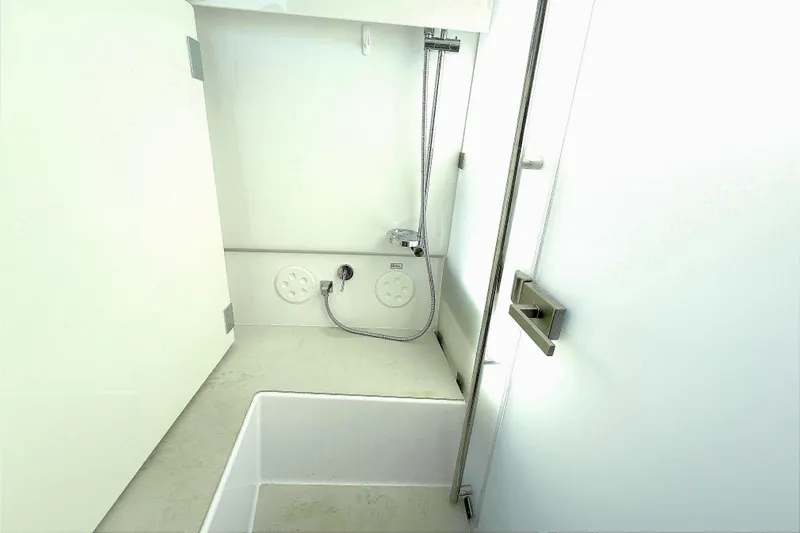  Yacht Photos Pics Interior of 2025 Axopar 37 XC CROSS CABIN bathroom with modern fixtures.