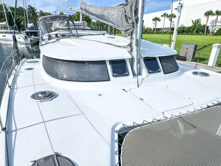 Breathing Room Yacht Photos Pics 2014 Fountaine Pajot Lipari 41 catamaran docked, showcasing sleek design and spacious deck.