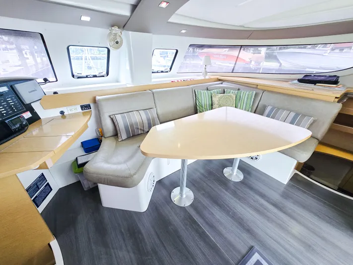 Breathing Room Yacht Photos Pics Interior of 2014 Fountaine Pajot Lipari 41 catamaran with modern seating and navigation equipment.