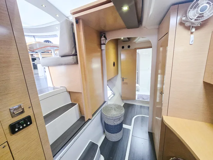 Breathing Room Yacht Photos Pics Interior of 2014 Fountaine Pajot Lipari 41 catamaran, featuring modern wood finishes and cozy layout.