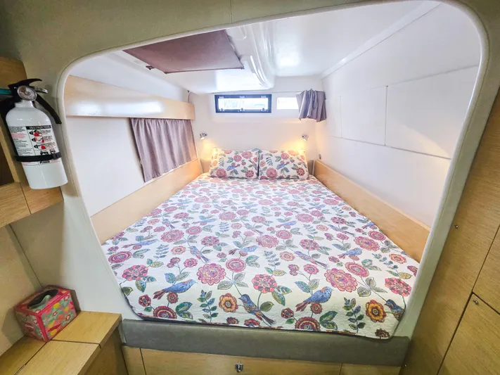 Breathing Room Yacht Photos Pics Cozy bedroom in 2014 Fountaine Pajot Lipari 41 catamaran with floral bedding and natural light.