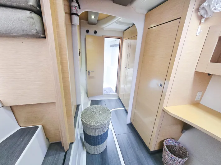 Breathing Room Yacht Photos Pics Interior of 2014 Fountaine Pajot Lipari 41 catamaran, featuring modern wood cabinetry and sleek design.