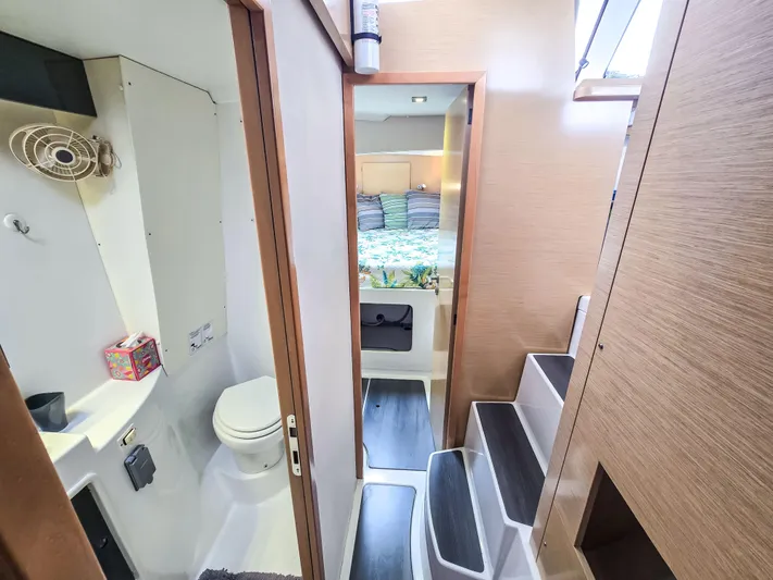 Breathing Room Yacht Photos Pics Interior of 2014 Fountaine Pajot Lipari 41 catamaran with bathroom and cozy bedroom.