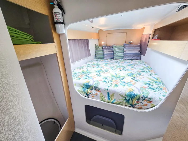 Breathing Room Yacht Photos Pics Cozy cabin interior of 2014 Fountaine Pajot Lipari 41 catamaran with floral bedding.