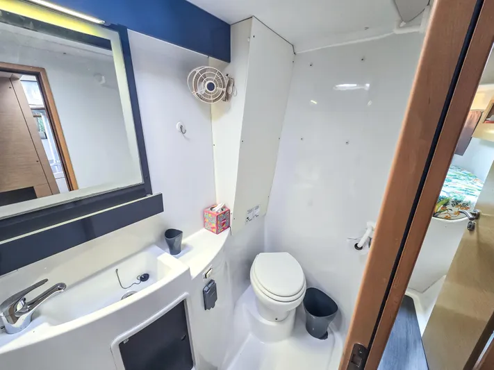 Breathing Room Yacht Photos Pics Bathroom interior of 2014 Fountaine Pajot Lipari 41 catamaran, featuring sink and toilet.