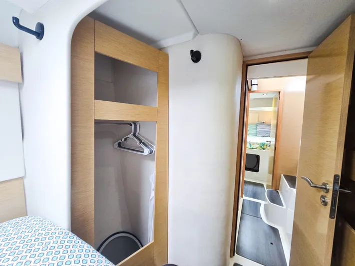 Breathing Room Yacht Photos Pics Interior of 2014 Fountaine Pajot Lipari 41 catamaran, featuring a cozy cabin and modern design.