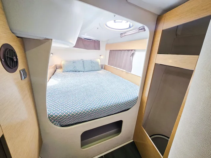Breathing Room Yacht Photos Pics Cozy cabin interior of 2014 Fountaine Pajot Lipari 41 catamaran with double bed.