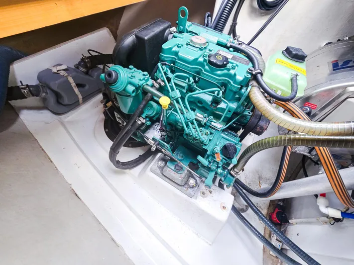 Breathing Room Yacht Photos Pics Engine compartment of a 2014 Fountaine Pajot Lipari 41 catamaran, showcasing mechanical components.