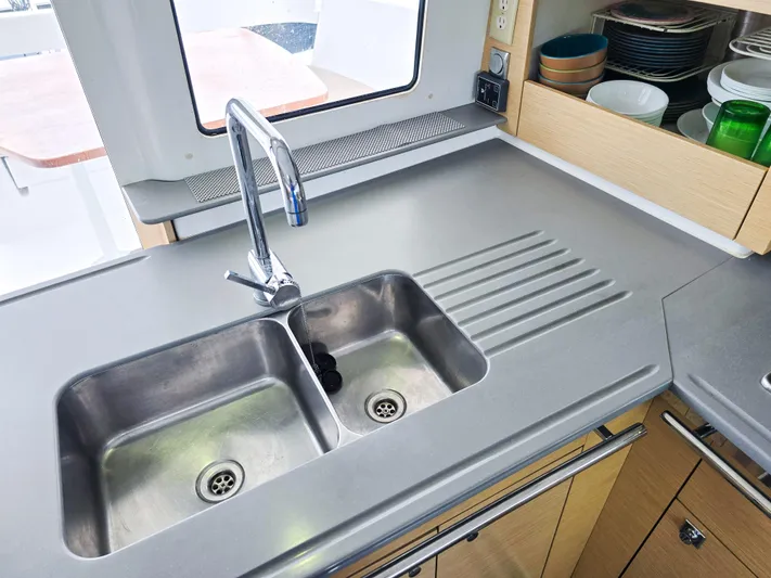 Breathing Room Yacht Photos Pics Modern kitchen sink in 2014 Fountaine Pajot Lipari 41 catamaran, featuring dual basins and sleek design.