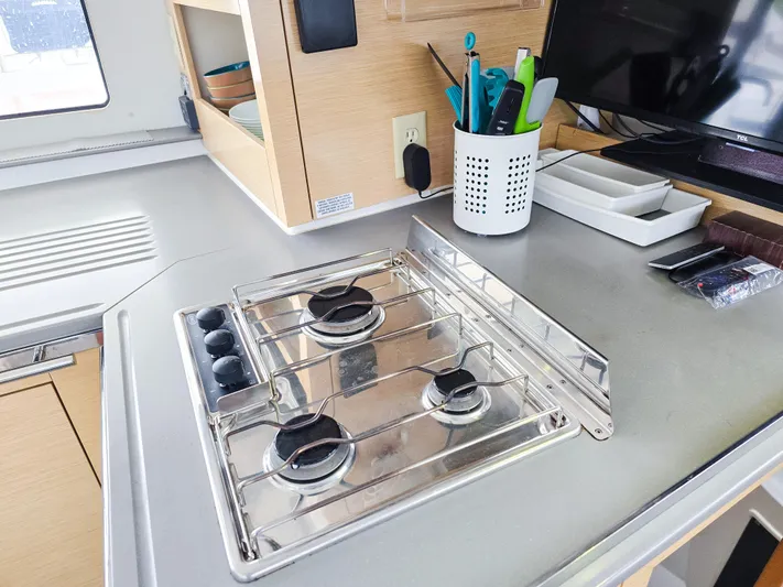 Breathing Room Yacht Photos Pics Modern kitchen in 2014 Fountaine Pajot Lipari 41 catamaran with stove and utensils.