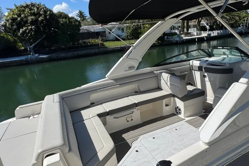  Yacht Photos Pics 2025 Sea Ray SDX 290 Outboard boat interior with spacious seating and elegant design.