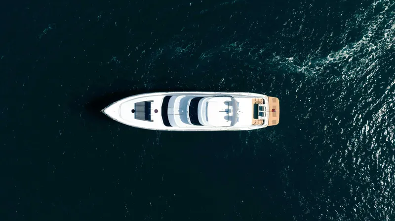 Infinite Yacht Photos Pics Overhead view of 1999 Warren Yachts 85 Motor Yacht on open water.