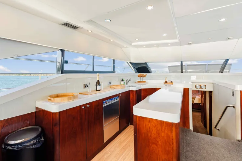 Infinite Yacht Photos Pics Luxurious interior of 1999 Warren Yachts 85 Motor Yacht with modern kitchen design.