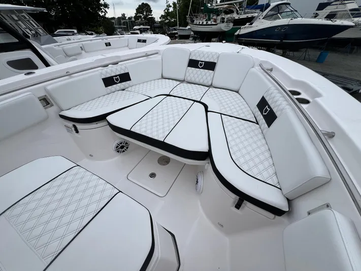  Yacht Photos Pics 2025 Sea Fox 288 Commander boat with luxurious white seating and diamond stitching.