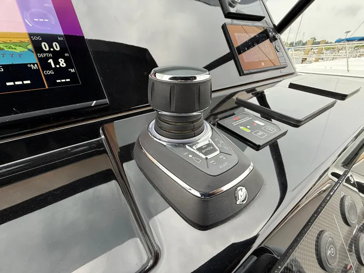  Yacht Photos Pics Control panel of 2025 Pardo Yachts 38 Outboard with joystick and digital displays.
