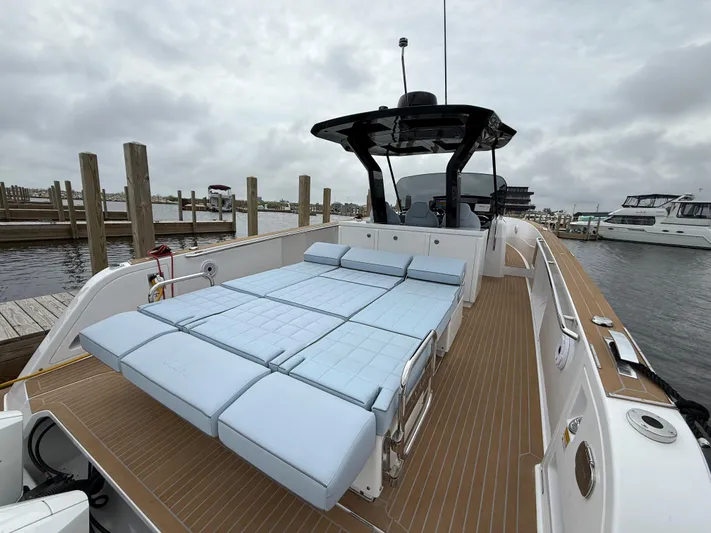  Yacht Photos Pics 2025 Pardo Yachts 38 Outboard with spacious deck and luxurious seating at marina.