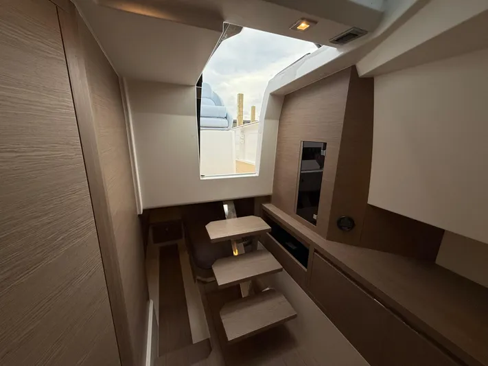  Yacht Photos Pics Interior of 2025 Pardo Yachts 38 Outboard, featuring modern wood finishes and sleek design.