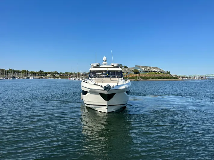 Meanwhile Yacht Photos Pics 2021 Prestige 420 S yacht cruising on a sunny day in a marina.