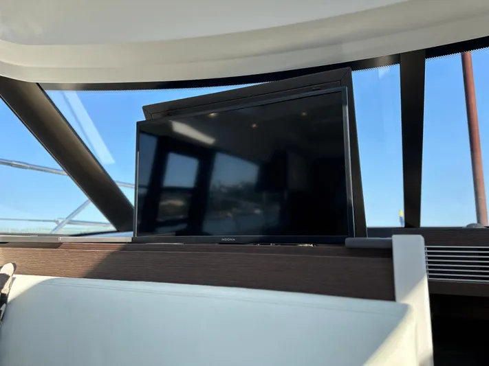 Meanwhile Yacht Photos Pics Flat-screen TV in the interior of a 2021 Prestige 420 S yacht.