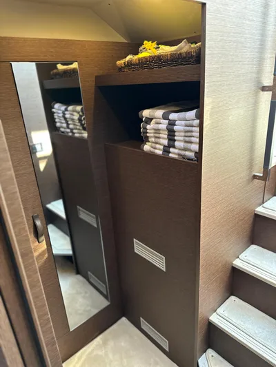 Meanwhile Yacht Photos Pics Luxury interior of 2021 Prestige 420 S yacht with mirror and towel storage.