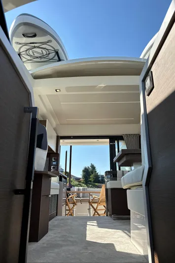 Meanwhile Yacht Photos Pics Interior view of 2021 Prestige 420 S yacht with open deck and seating area.