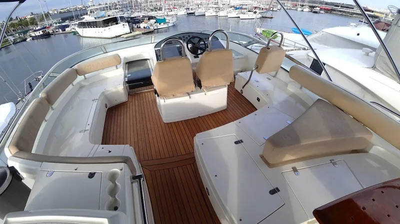  Yacht Photos Pics Luxurious 2004 Fairline Squadron 74 yacht interior with spacious seating and elegant design.