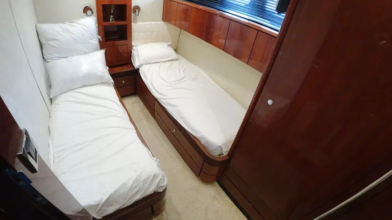  Yacht Photos Pics Twin cabin with wooden furnishings in 2004 Fairline Squadron 74 yacht.