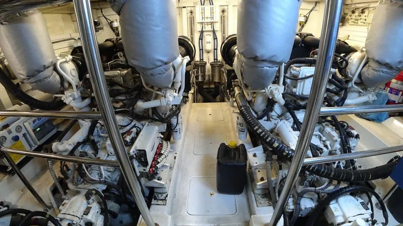  Yacht Photos Pics Engine room of a 2004 Fairline Squadron 74 yacht, showcasing dual engines and mechanical components.