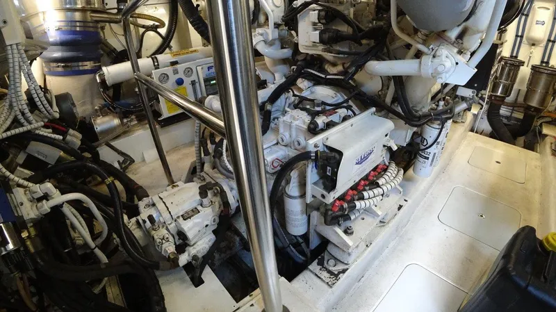  Yacht Photos Pics Engine room of a 2004 Fairline Squadron 74 yacht, showcasing complex machinery and wiring.