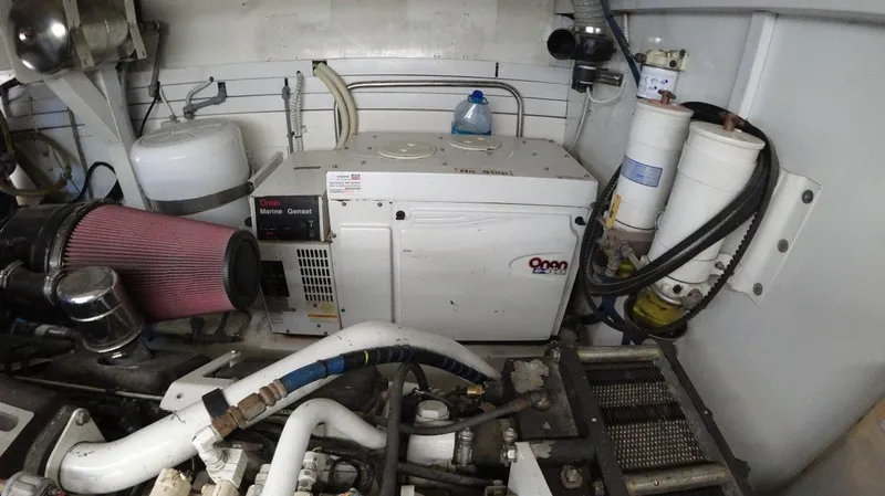  Yacht Photos Pics Engine room of 2004 Fairline Squadron 74 yacht with generator and equipment.