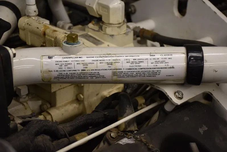  Yacht Photos Pics Engine compartment of a 2004 Fairline Squadron 74 yacht, featuring Caterpillar components.