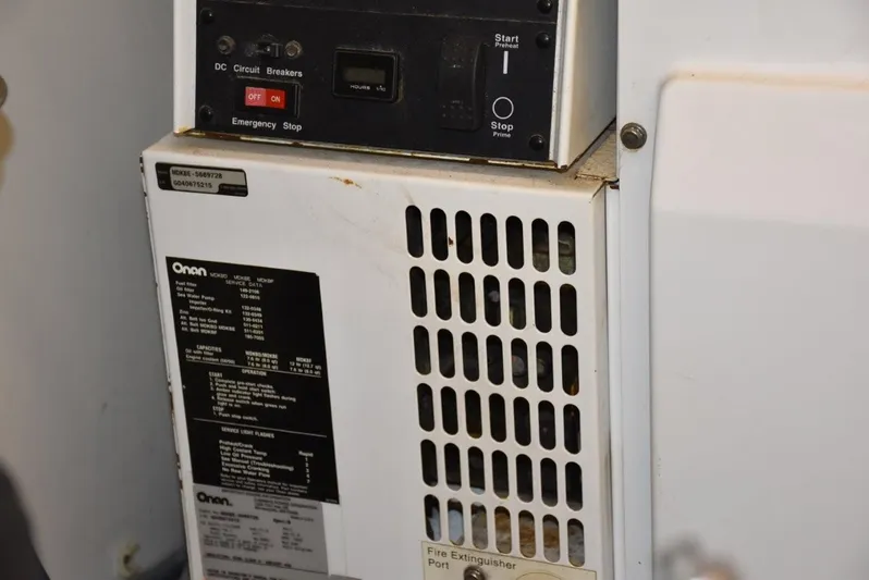  Yacht Photos Pics Control panel of a 2004 Fairline Squadron 74 yacht, featuring Onan generator details.