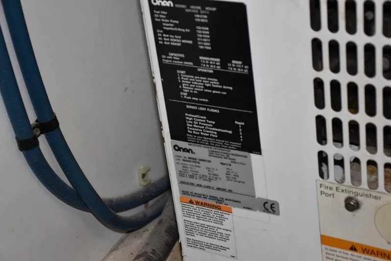  Yacht Photos Pics Onan generator label on 2004 Fairline Squadron 74 yacht, showing specifications and warnings.