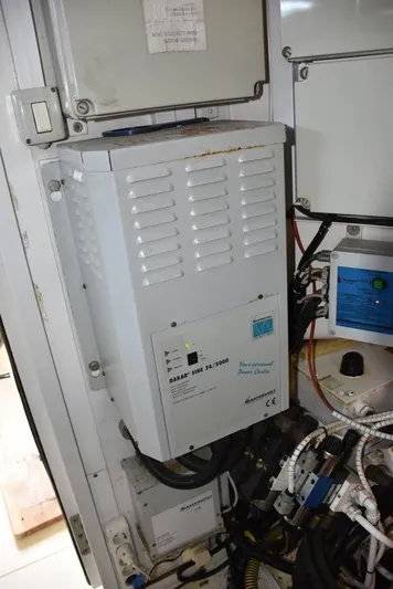  Yacht Photos Pics Electrical panel inside 2004 Fairline Squadron 74 yacht, featuring various components and wiring.