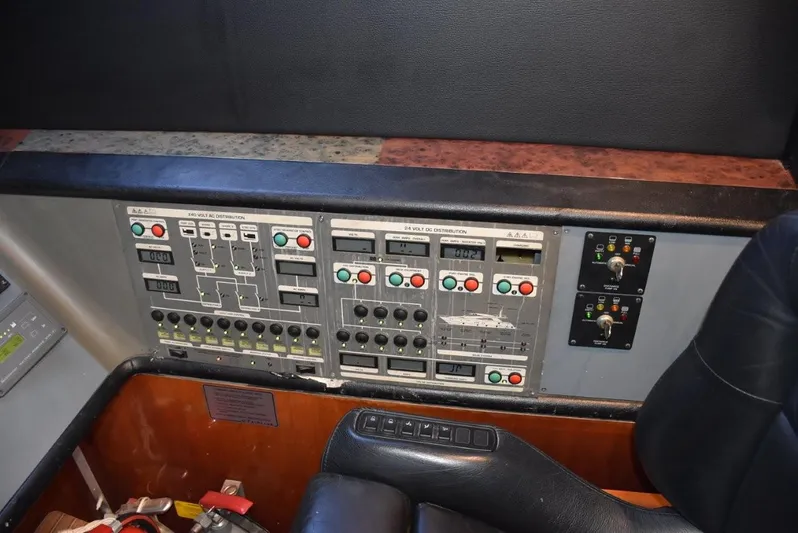  Yacht Photos Pics Control panel of a 2004 Fairline Squadron 74 yacht, featuring various switches and buttons.