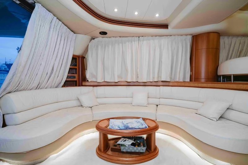 Marshej Yacht Photos Pics Luxurious interior of 2008 Azimut Fly 68 yacht with elegant white seating and wooden accents.