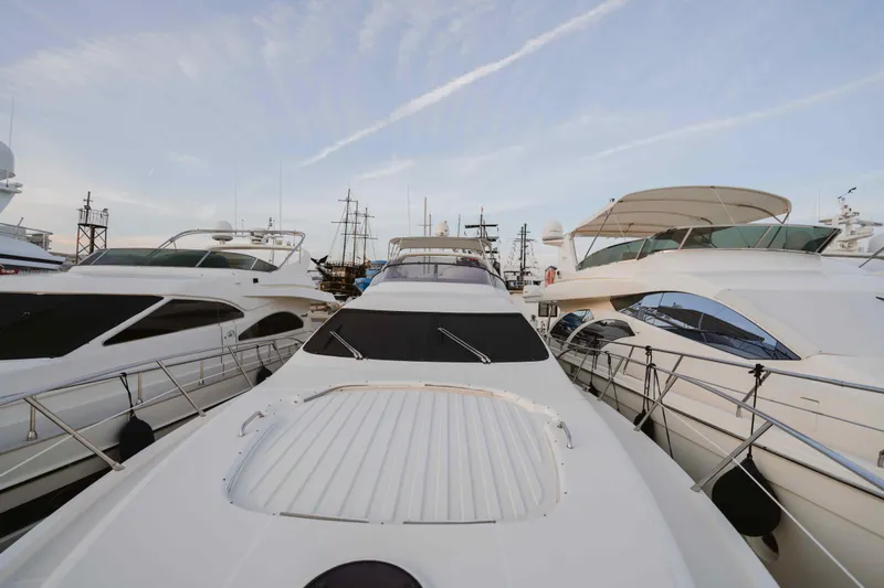 Marshej Yacht Photos Pics Luxury yachts docked at marina, featuring 2008 Azimut Fly 68 model.