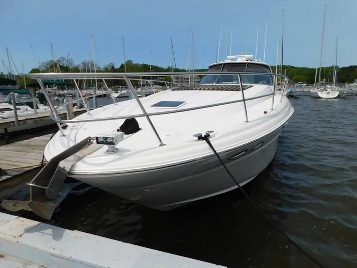  Yacht Photos Pics 2001 Sea Ray 510 Sundancer yacht docked at marina, front view.