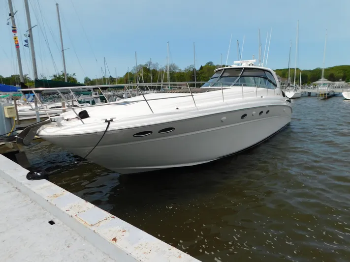  Yacht Photos Pics 2001 Sea Ray 510 Sundancer yacht docked at marina, side view.