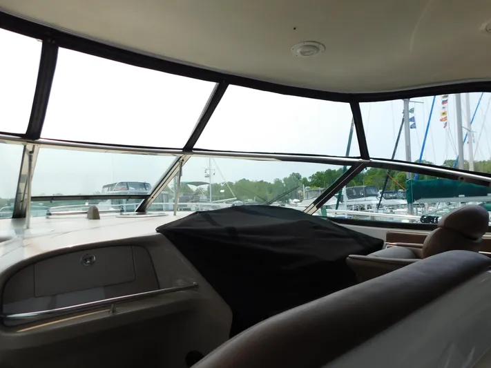  Yacht Photos Pics Interior view of 2001 Sea Ray 510 Sundancer yacht with marina background.