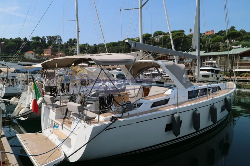  Yacht Photos Pics 2016 Grand Soleil 46 LC yacht docked in a marina, featuring sleek design and modern amenities.