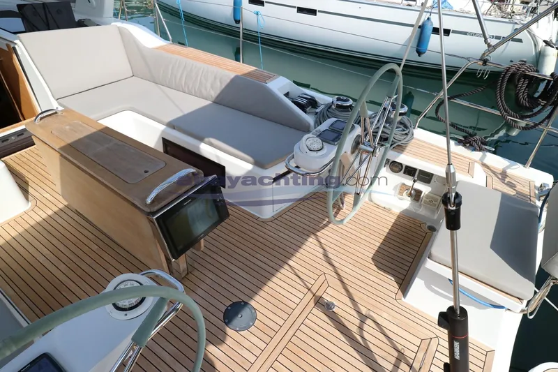  Yacht Photos Pics 2016 Grand Soleil 46 LC yacht cockpit with teak decking and dual steering wheels.
